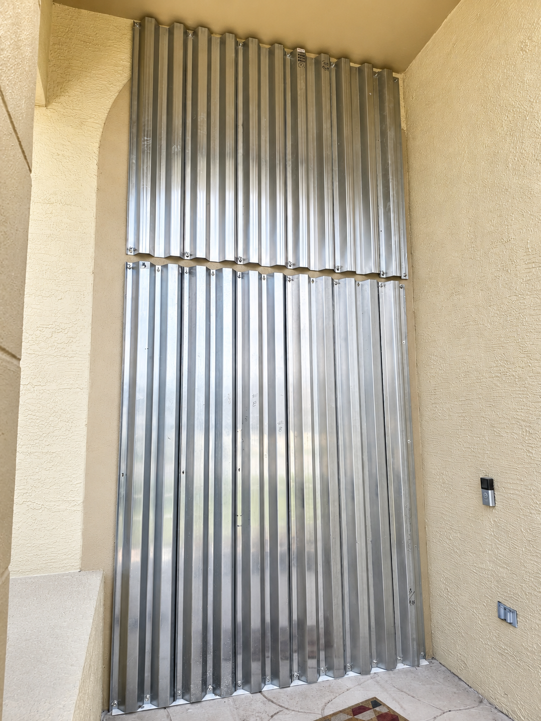Aluminum hurricane panels installed on Florida home